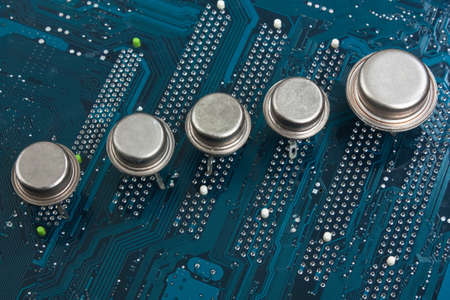 old silicon chip on the electronic boardの写真素材