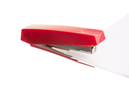 red stapler isolated on white backgroundの写真素材