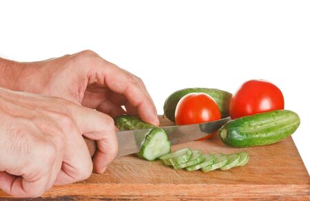 chop tomatoes and cucumbers  isolated  on white backgroundの写真素材