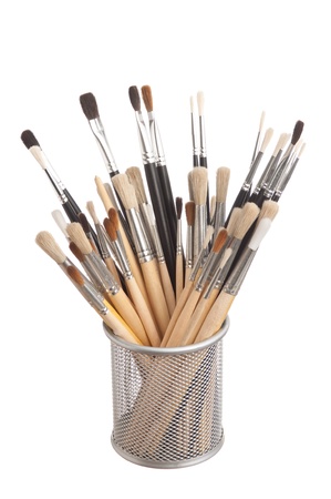 brush to paint in the basket  isolated on a white backgroundの写真素材