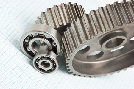 gears and bearings on graph paperの写真素材