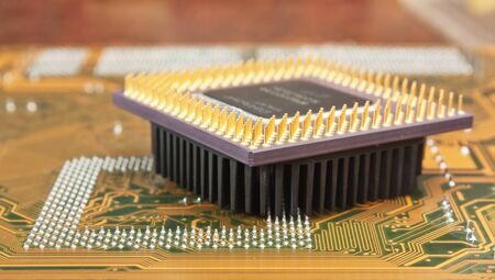 old silicon chip on the electronic boardの写真素材