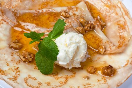 Ice cream with honey and walnutsの写真素材