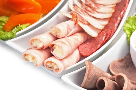 dish of assorted sausages and vegetablesの写真素材