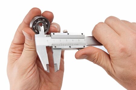 callipers with  bearing in hand   isolated on white backgroundの写真素材