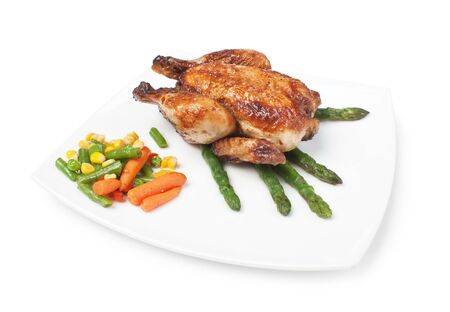 dish of fried chicken with vegetables  isolated on white backgroundの写真素材