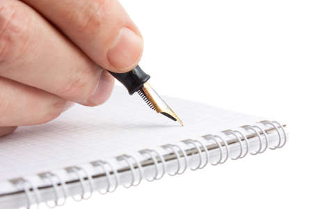 pen in hand  isolated on white backgroundの写真素材