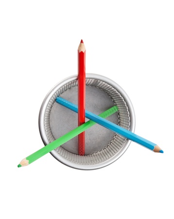 color pencils in basket isolated on a white  backgroundの写真素材