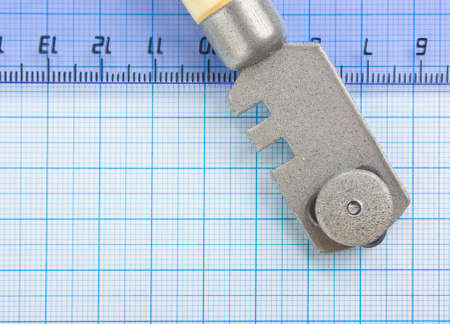 glass cutter and  ruler on the glassの写真素材