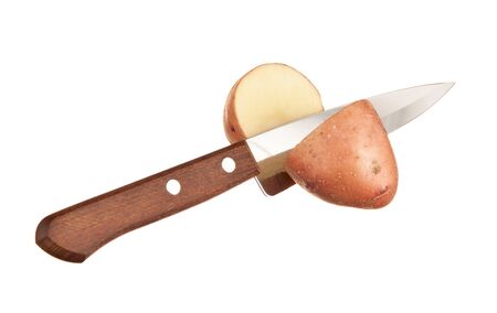 potato and a knife  isolated on white backgroundの写真素材