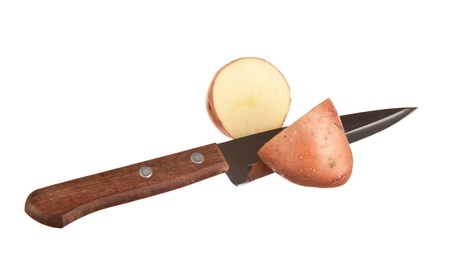 potato and a knife  isolated on white backgroundの写真素材
