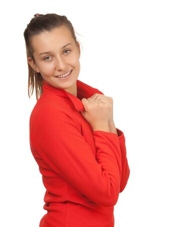 portrait of a young smiling girl isolated on a white backgroundの写真素材