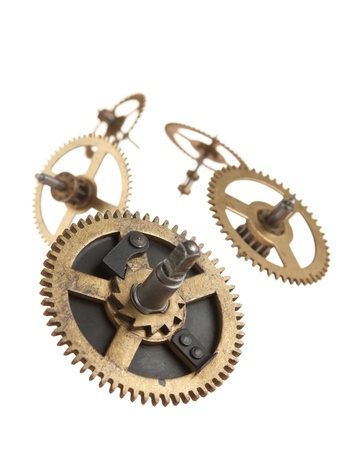 clockwork gears isolated on white backgroundの写真素材