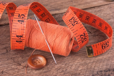 still life of spools of thread on a wooden backgroundの写真素材