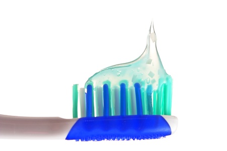 toothbrush with toothpaste isolated on a white  background 