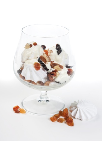ice cream with prunes and walnuts  isolated on whiteの写真素材