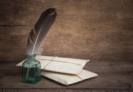 letter and a quill in the inkwellの写真素材