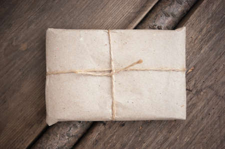  parcel wrapped with brown kraft paper and tied with twineの写真素材