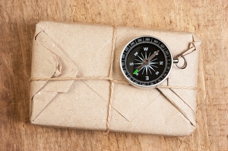 pile parcel wrapped with brown kraft paper and tied with twineの写真素材