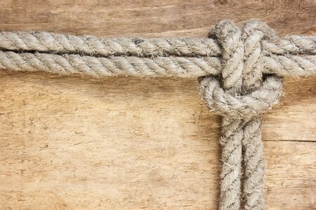 frame made of rope on a wooden background