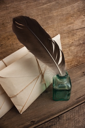 letter and a quill in the inkwellの写真素材
