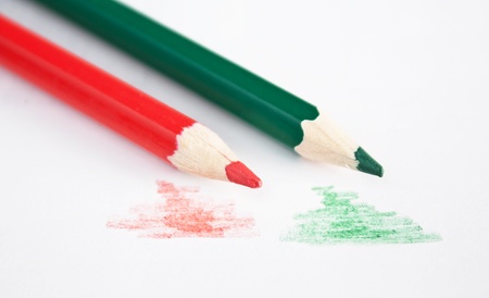 red and green pencil on the notepadの写真素材