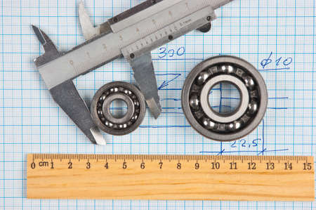 technical tools on a background of graph paperの写真素材