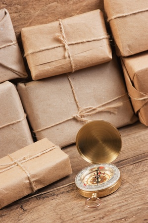pile parcel wrapped with brown kraft paper and tied with twineの写真素材