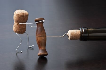  wine corks and bottle with the corkscrewの写真素材