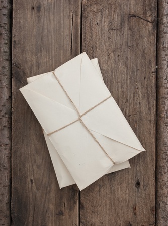 pile parcel wrapped with brown kraft paper and tied with twine