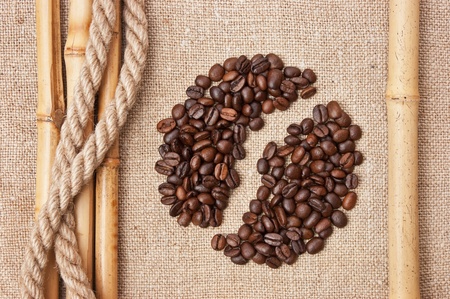 coffee beans on a sack backgroundの写真素材