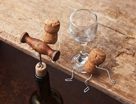 Figures from wine corks and bottle with the corkscrewの写真素材