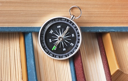 compass and the old books