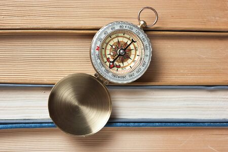 compass and the old books