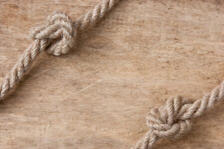 frame made of rope on a wooden background