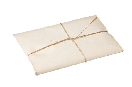 parcel wrapped with brown kraft paper isolated on white background