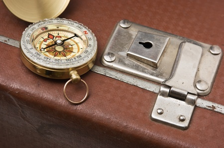 old suitcase  and compass
