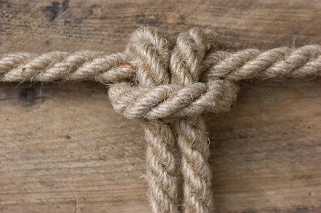 Marine knot on a wooden backgroundの写真素材