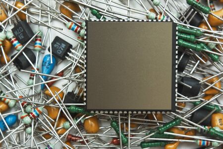 microchip on a pile of electronic components