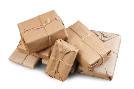 pile parcel wrapped with brown kraft paper and tied with twine