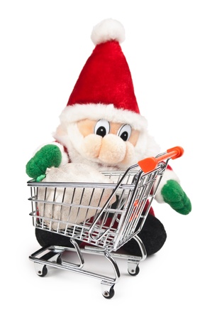 Santa Claus and shopping cart isolated on white background の写真素材