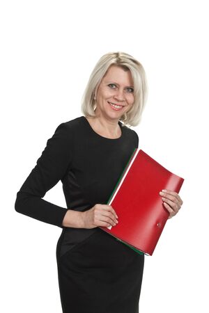 Portrait of a mature business woman with documents in hand isolated on white backgroundの写真素材