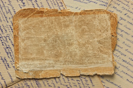 Vintage background with old paper and lettersの写真素材