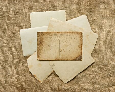 Vintage background with old postcard and lettersの写真素材