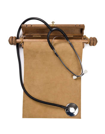 Blank parchment manuscript and stethoscope isolated on white background の写真素材