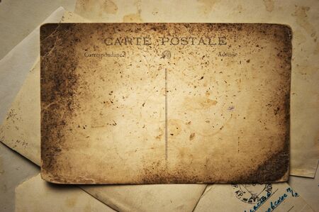 Vintage background with old postcard and lettersの写真素材
