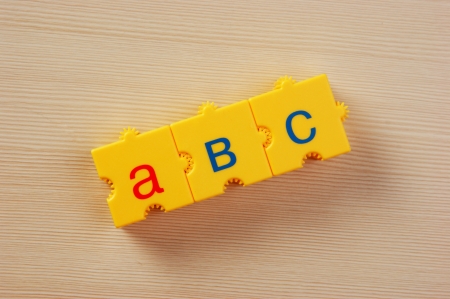 School cubes with letters on the tableの写真素材