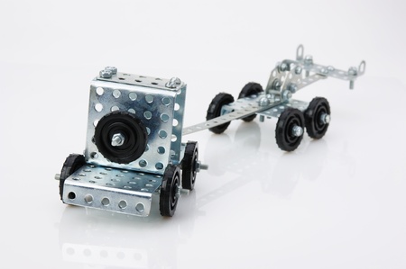truck tractor toy - metal kit for construction on white backgroundの写真素材