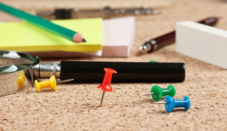 stationery in a mess on the tableの写真素材