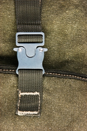 buckle on the old green backpackの写真素材